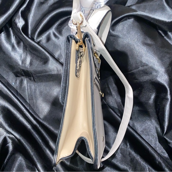 Aldo ANNIEBROOK Cream, tan and Snake Print Shoulder Bag. Elegant accent bow. - Picture 9 of 15